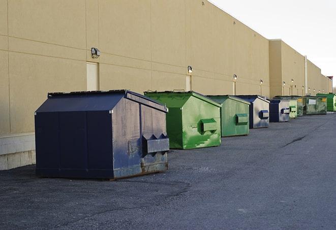 construction-grade dumpsters ready for use in Clearlake Oaks